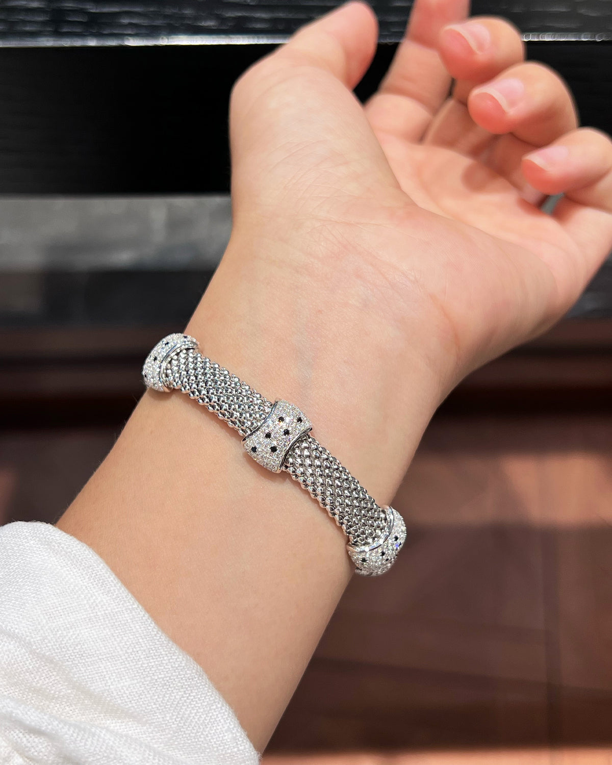 Silver Woven Leopard Cuff Bracelet on Model Wrist - Noble Aurora
