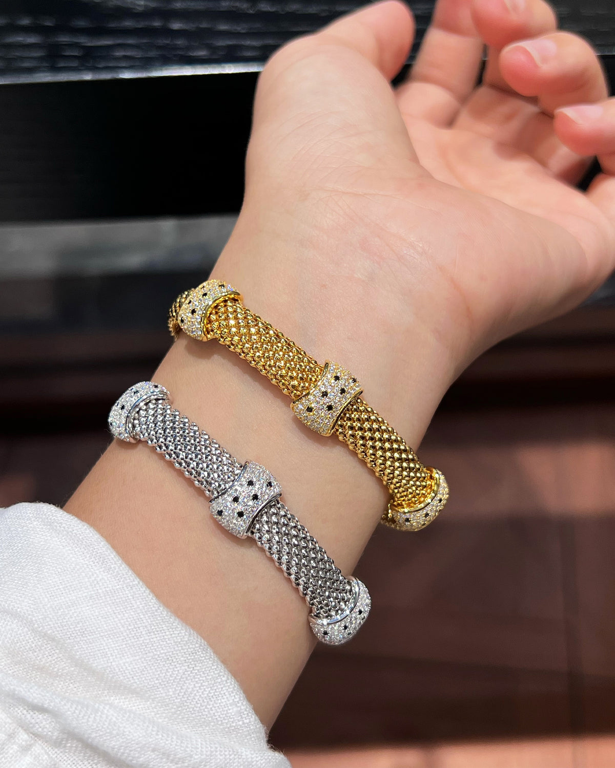 Gold and Silver Woven Leopard Cuff Bracelets Stacked on Model - Noble Aurora