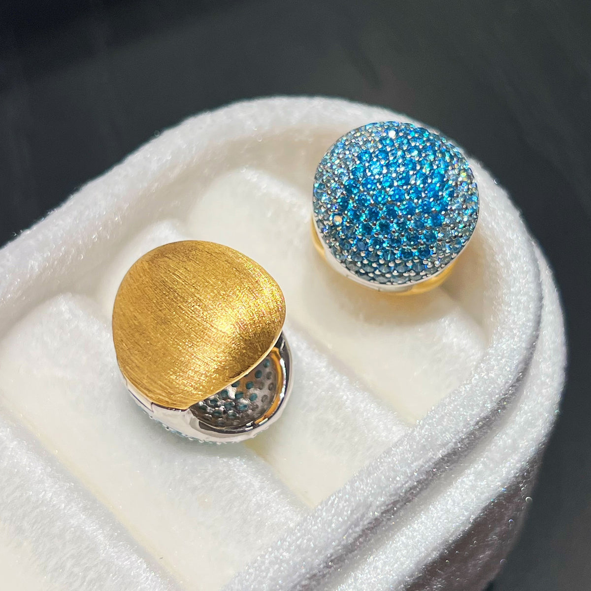 Reversible blue CZ huggie hoop earrings with 18K gold plated sterling silver design