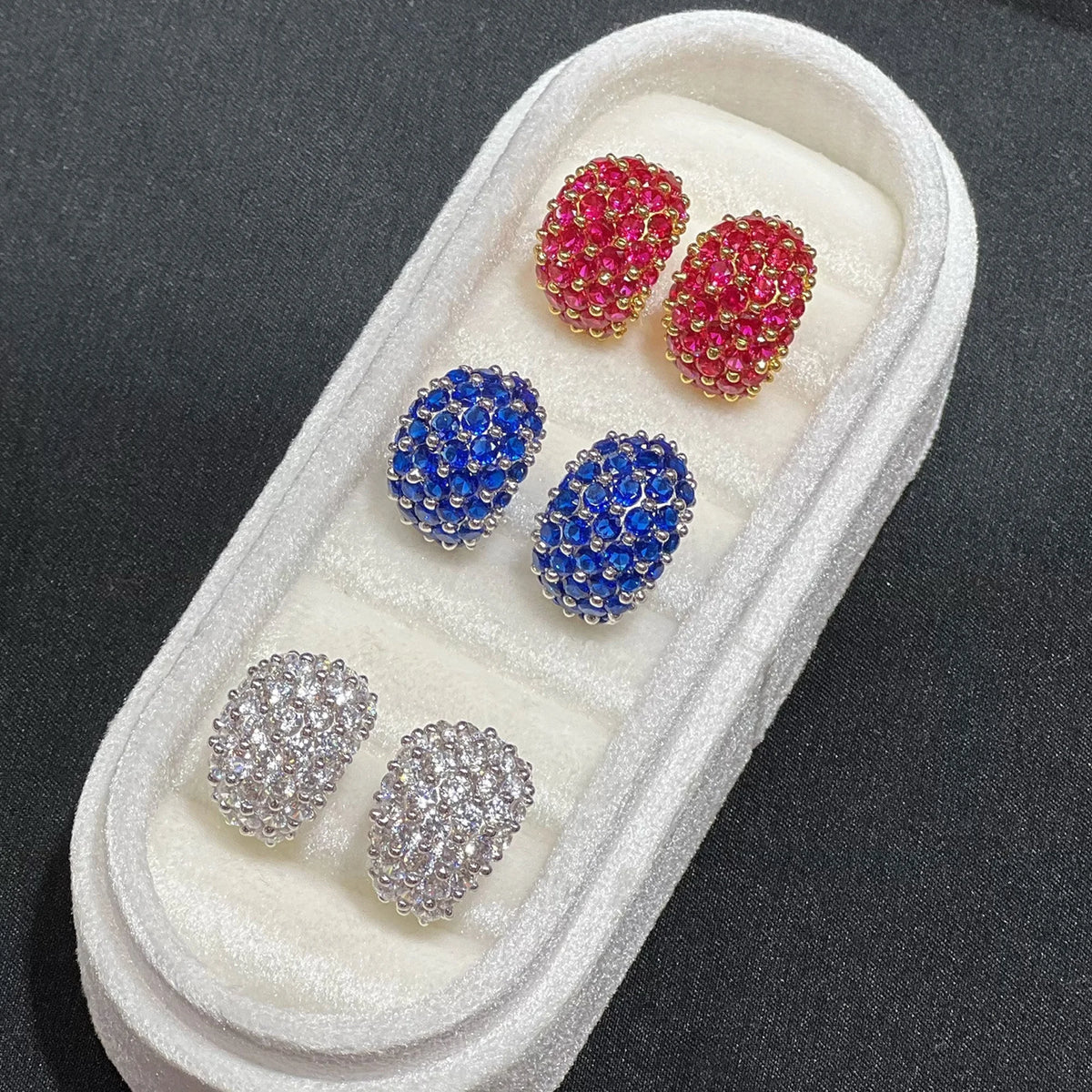 Red blue and clear pavé cubic zirconia wide clip-on earrings