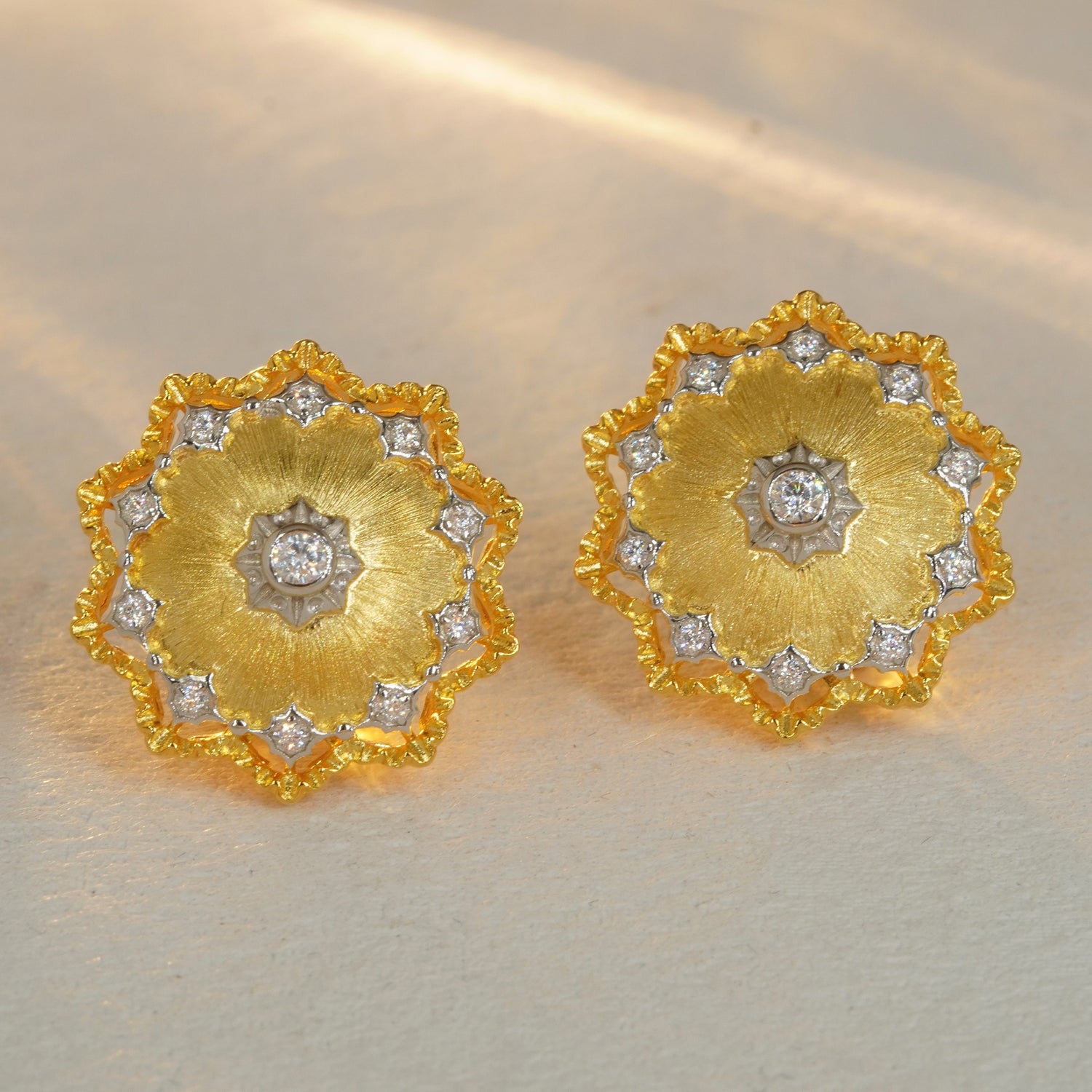 vintage floral CZ halo stud earrings with brushed gold flower design
