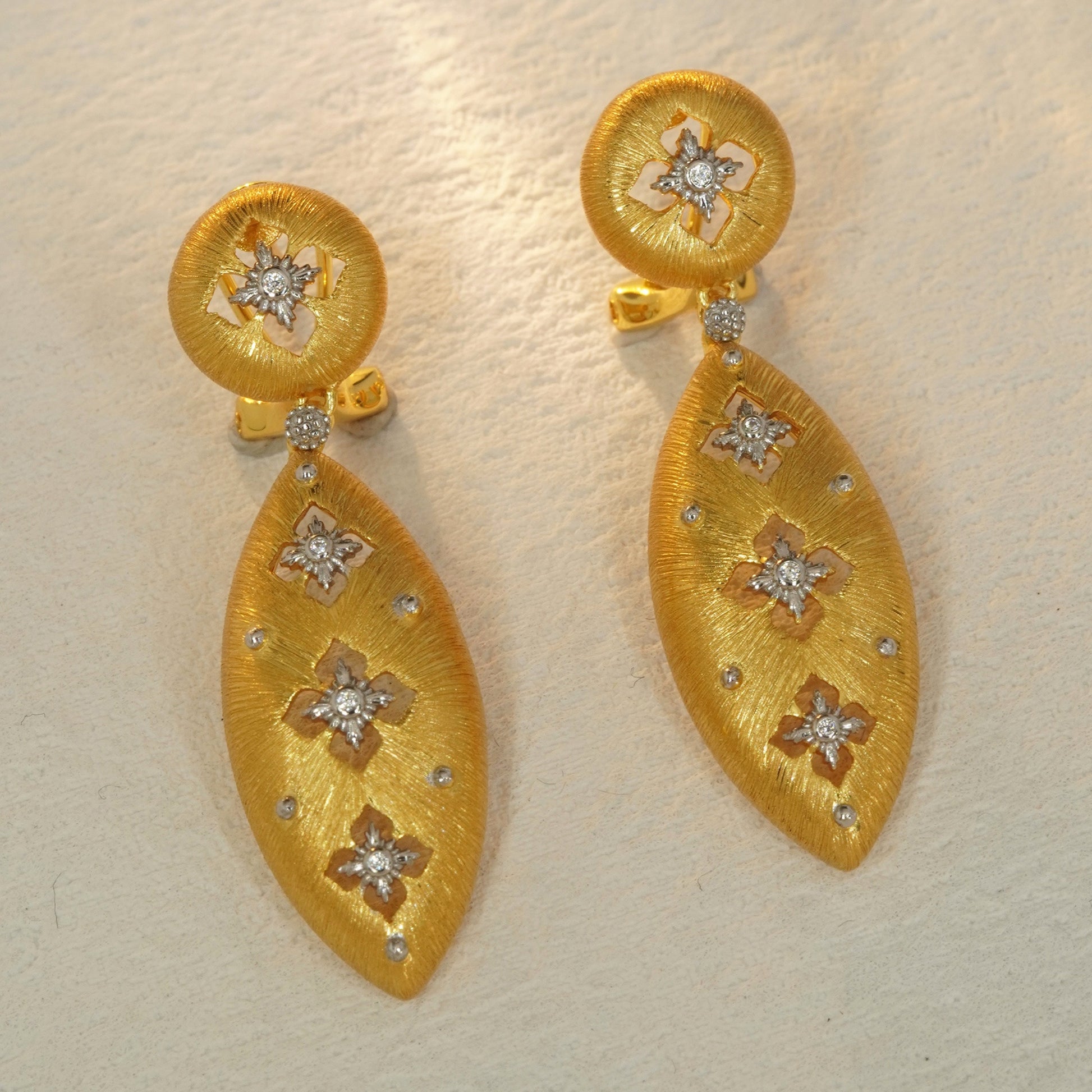 18K gold plated floral teardrop earrings with brushed texture and CZ accents