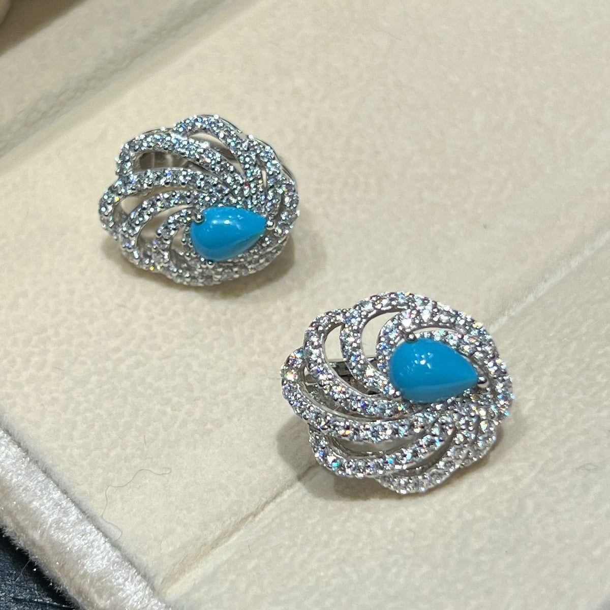 Created Turquoise Teardrop Swirl Wing Studs - Detail View