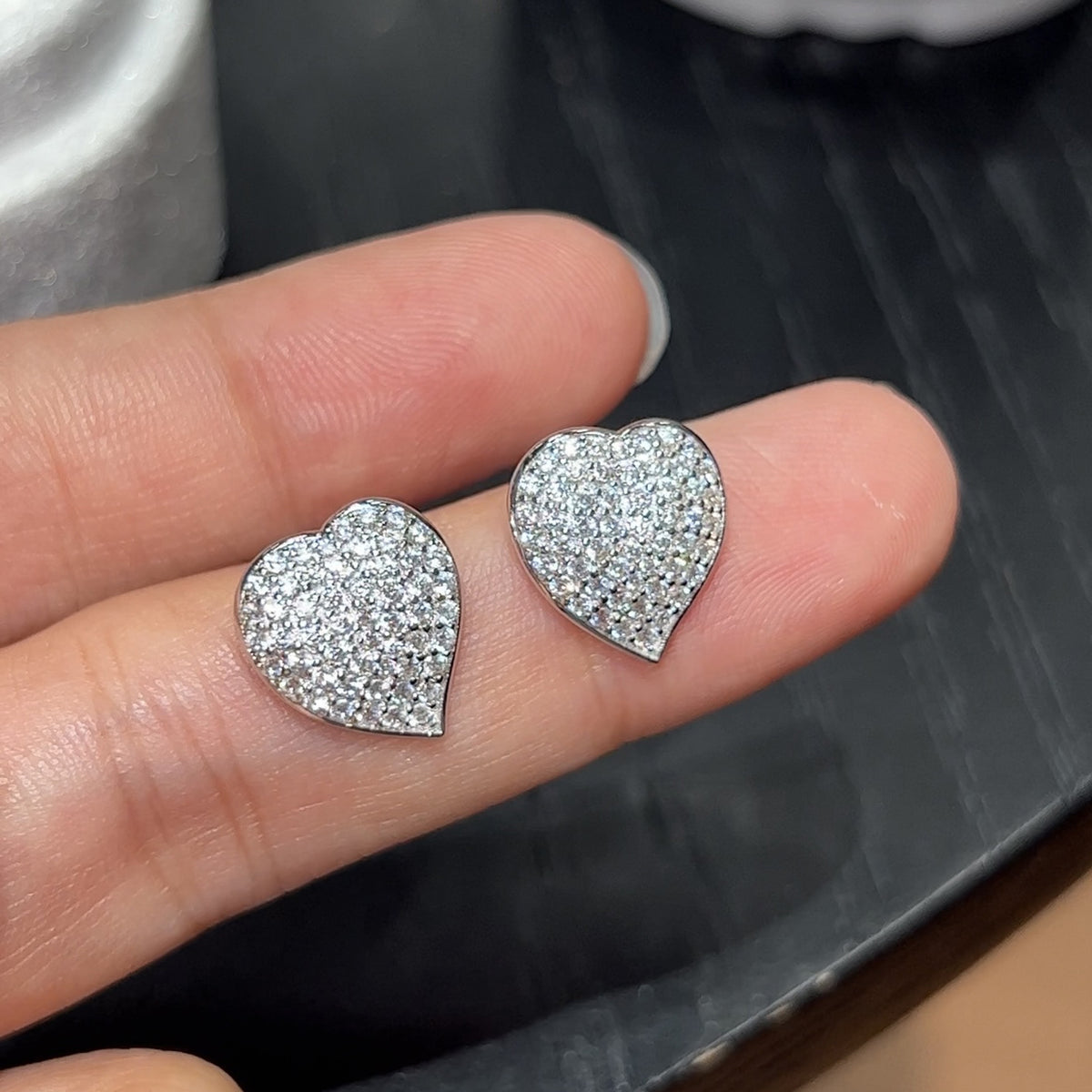 Pavé 5A CZ Heart Stud Earrings Handheld View - 925 Sterling Silver