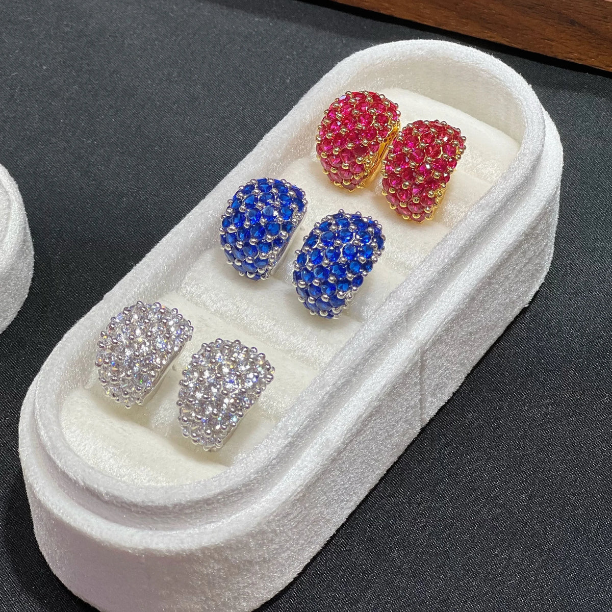 Three colorways of sculpted wide CZ clip-on earrings