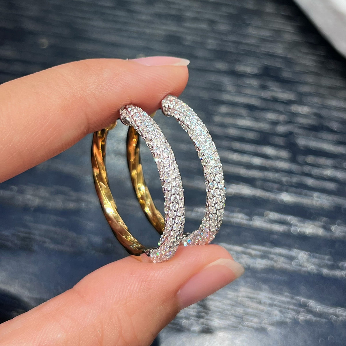Two-Tone Pavé CZ Hoop Earrings Handheld Front View - Noble Aurora