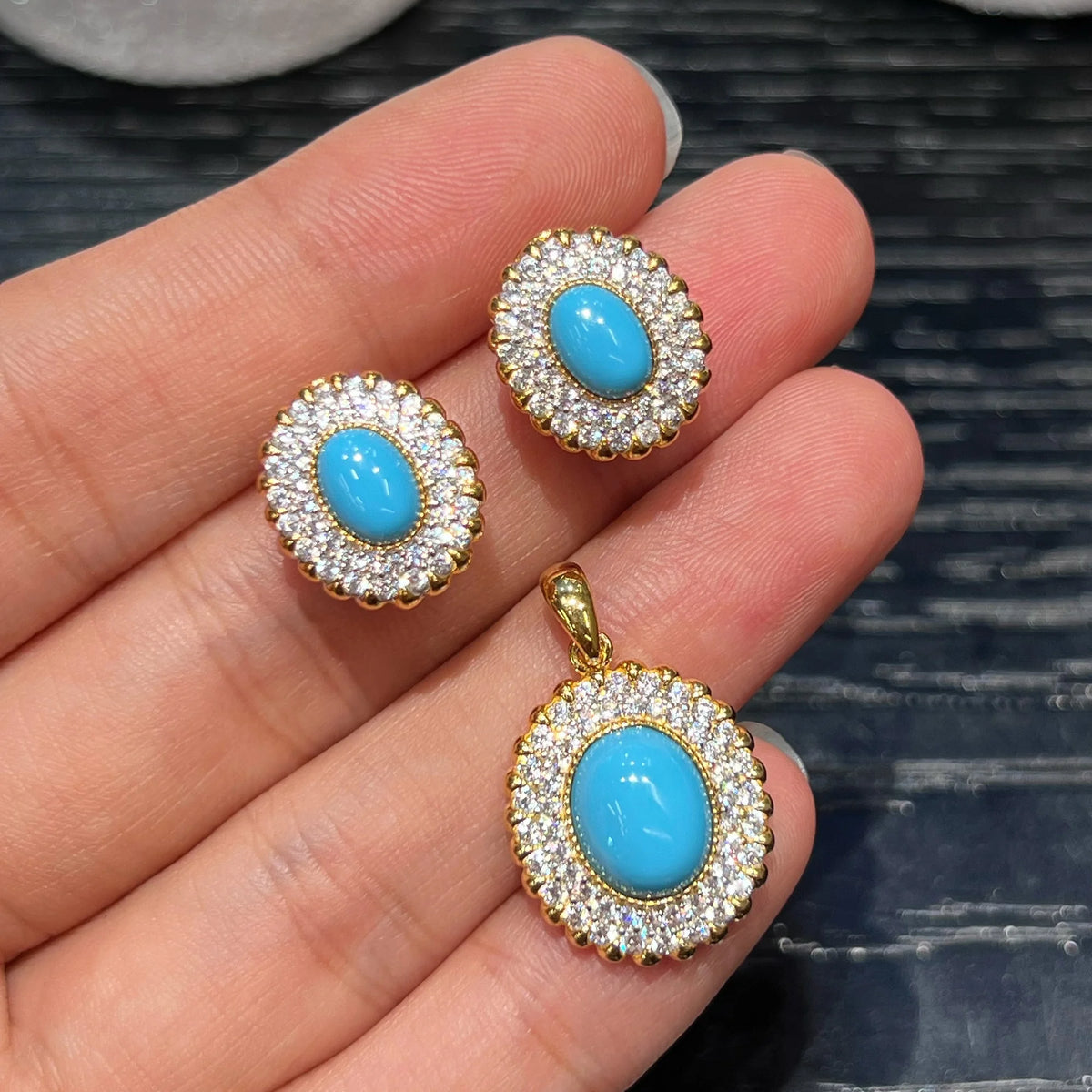 Close-up scale view of the oval created turquoise and 5A cubic zirconia jewelry set
