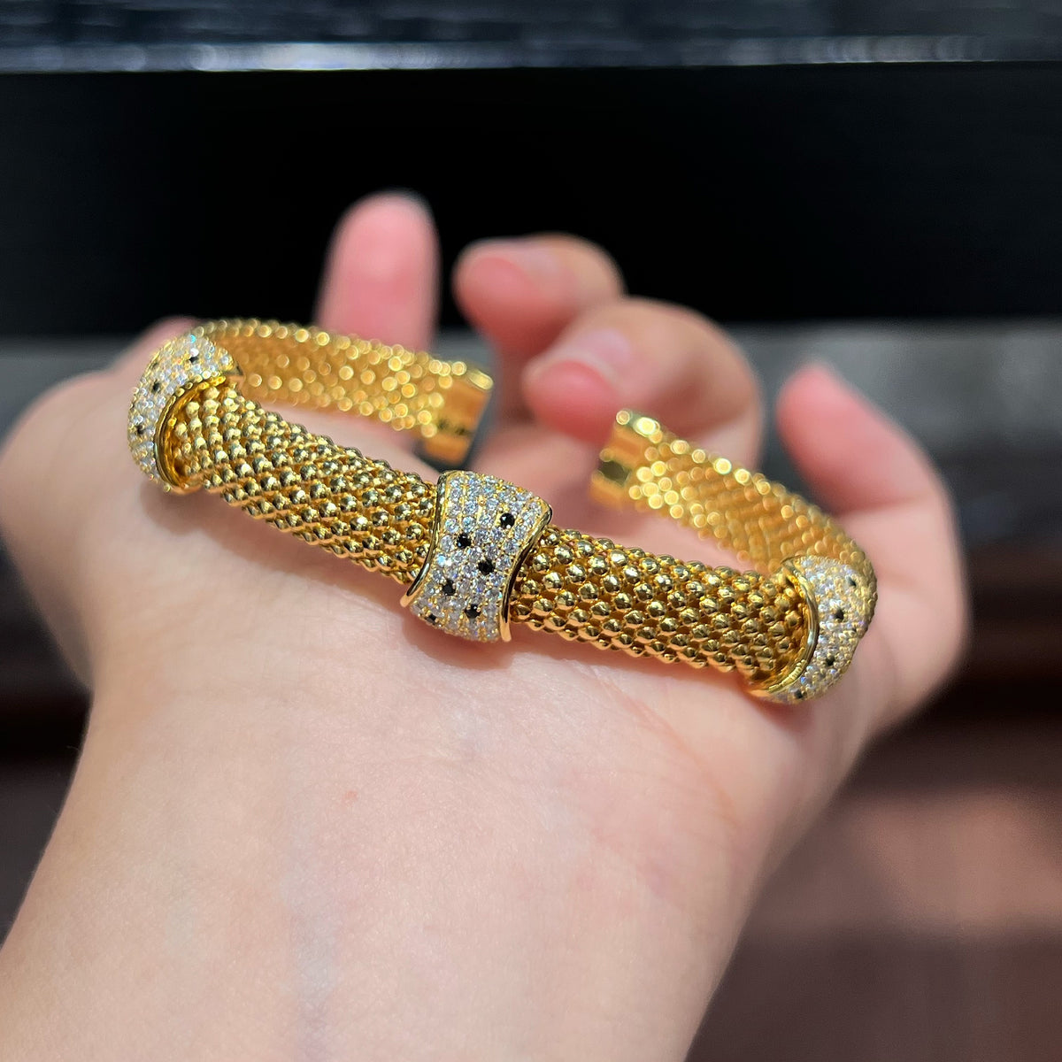 Gold Woven Leopard Cuff Bracelet 5A CZ Handheld View - Noble Aurora