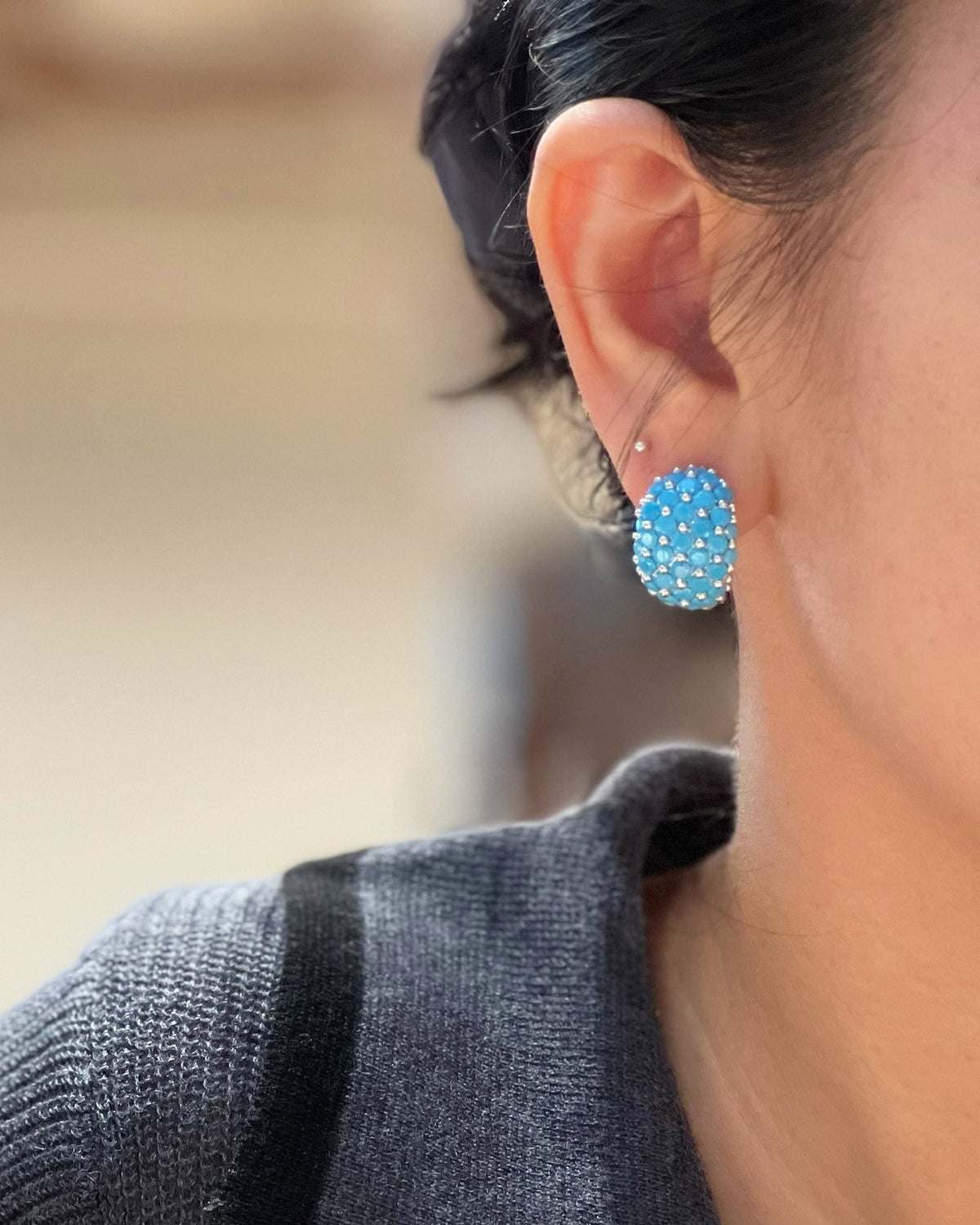 Created Turquoise Wide Huggie Earrings on Ear - Noble Aurora