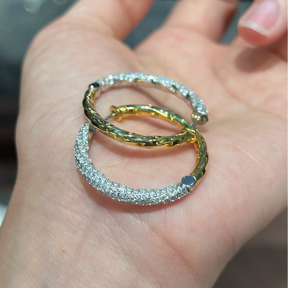 Sculpted Two-Tone Pavé CZ Hoop Earrings Handheld View - Noble Aurora