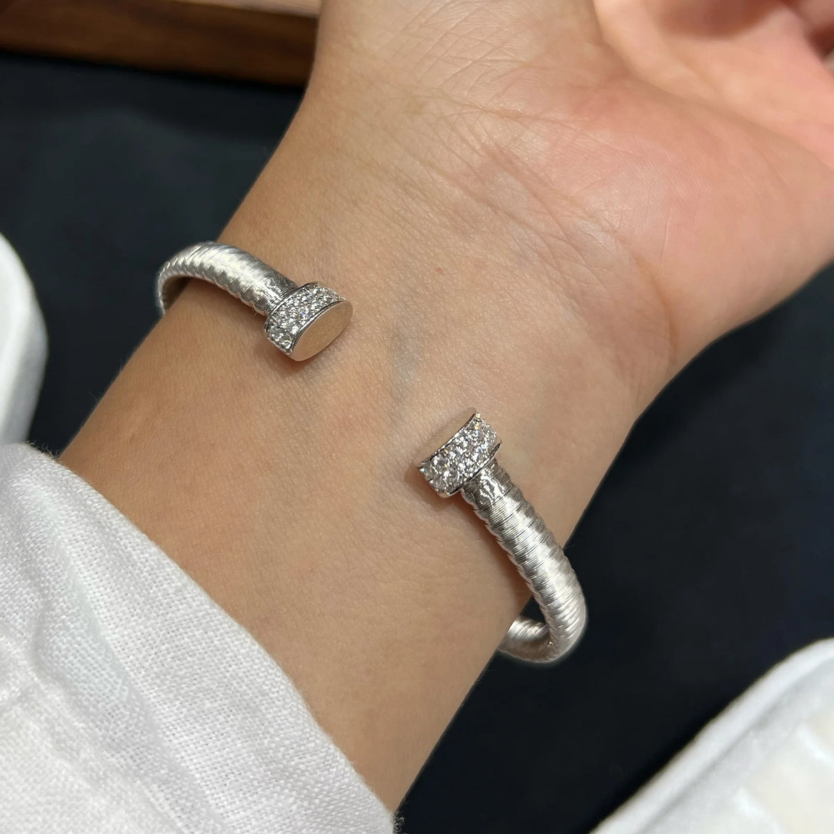 Silver cuff bracelet with pavé 5A cubic zirconia end caps
