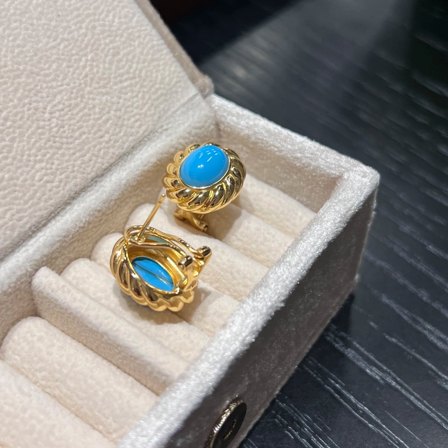 side view of 18k gold plated sterling silver turquoise stud earrings
