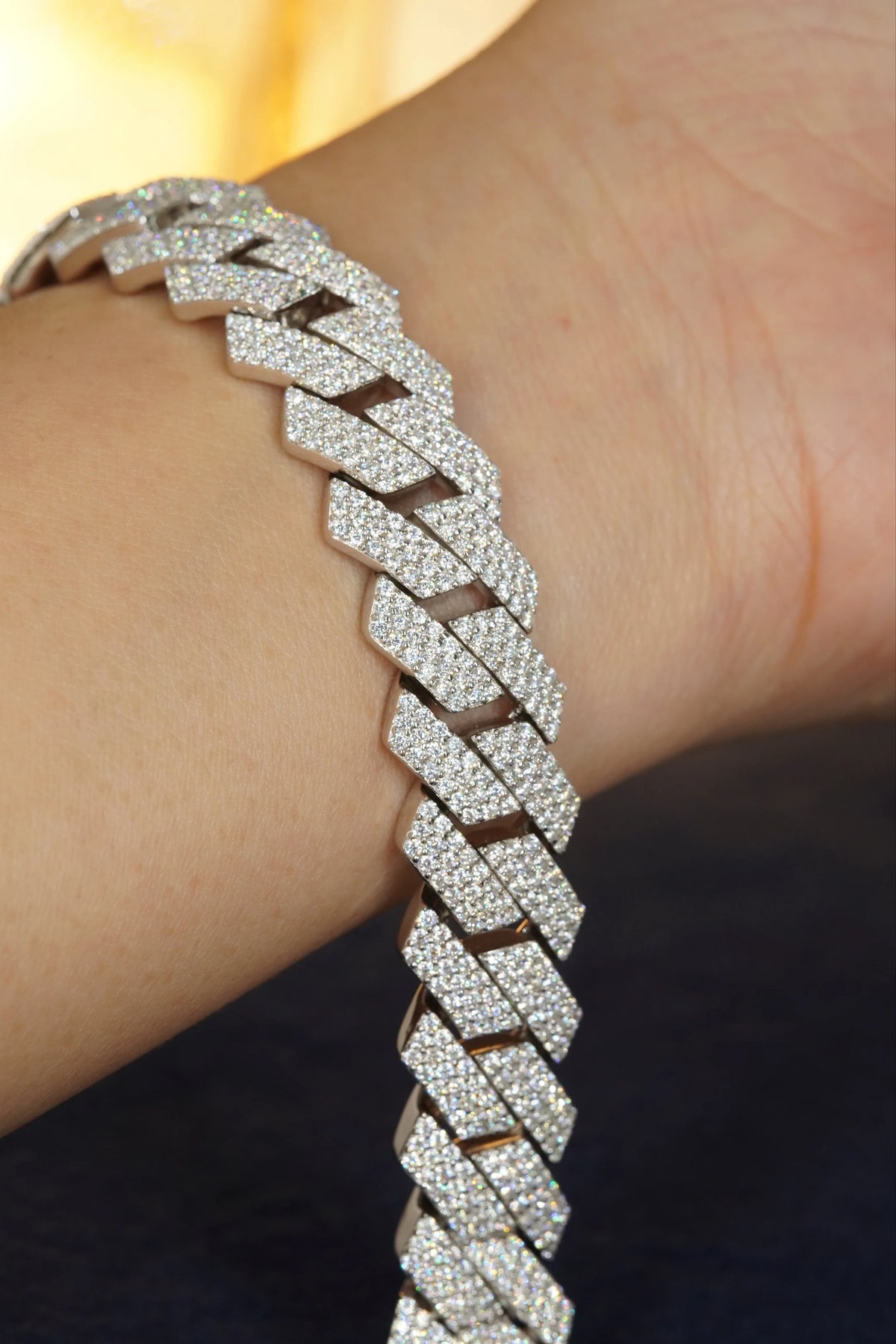 Pavé square Cuban link bracelet worn on wrist