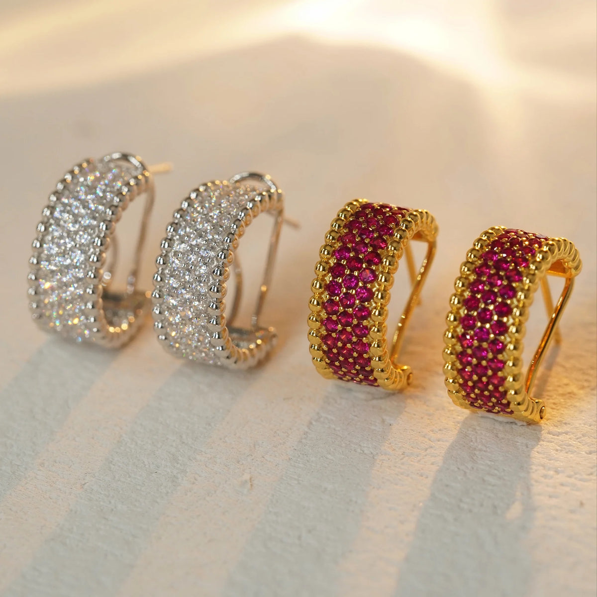 Beaded-edge pavé hoop earrings in silver clear and gold red colorways