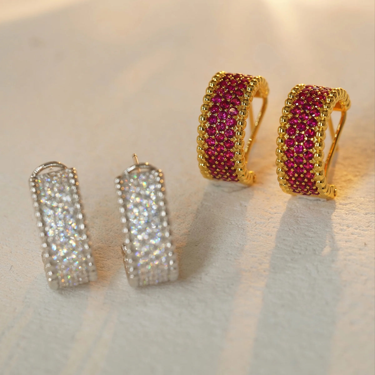 Two-tone colorway comparison of beaded-edge pavé hoop earrings