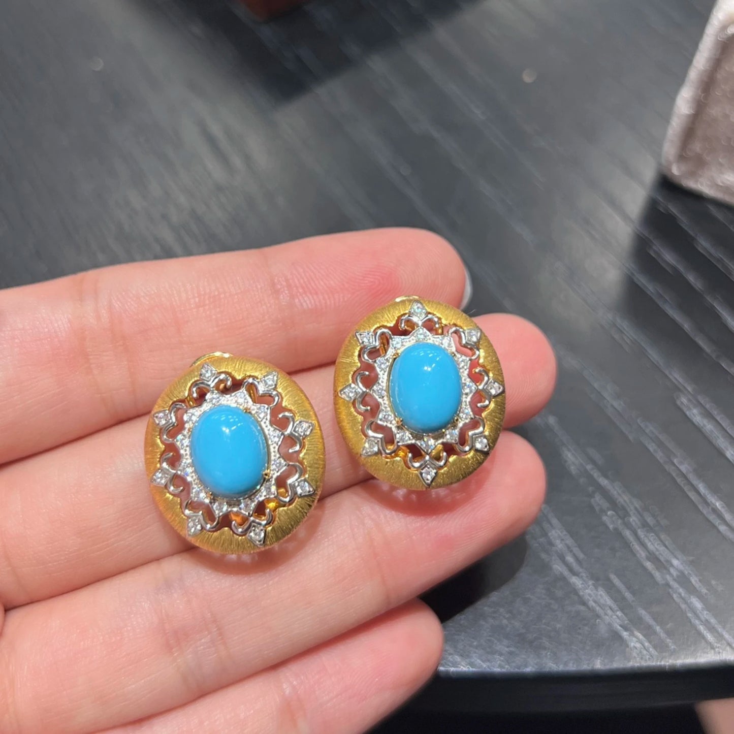 close up vintage blue turquoise earrings with cubic zirconia details