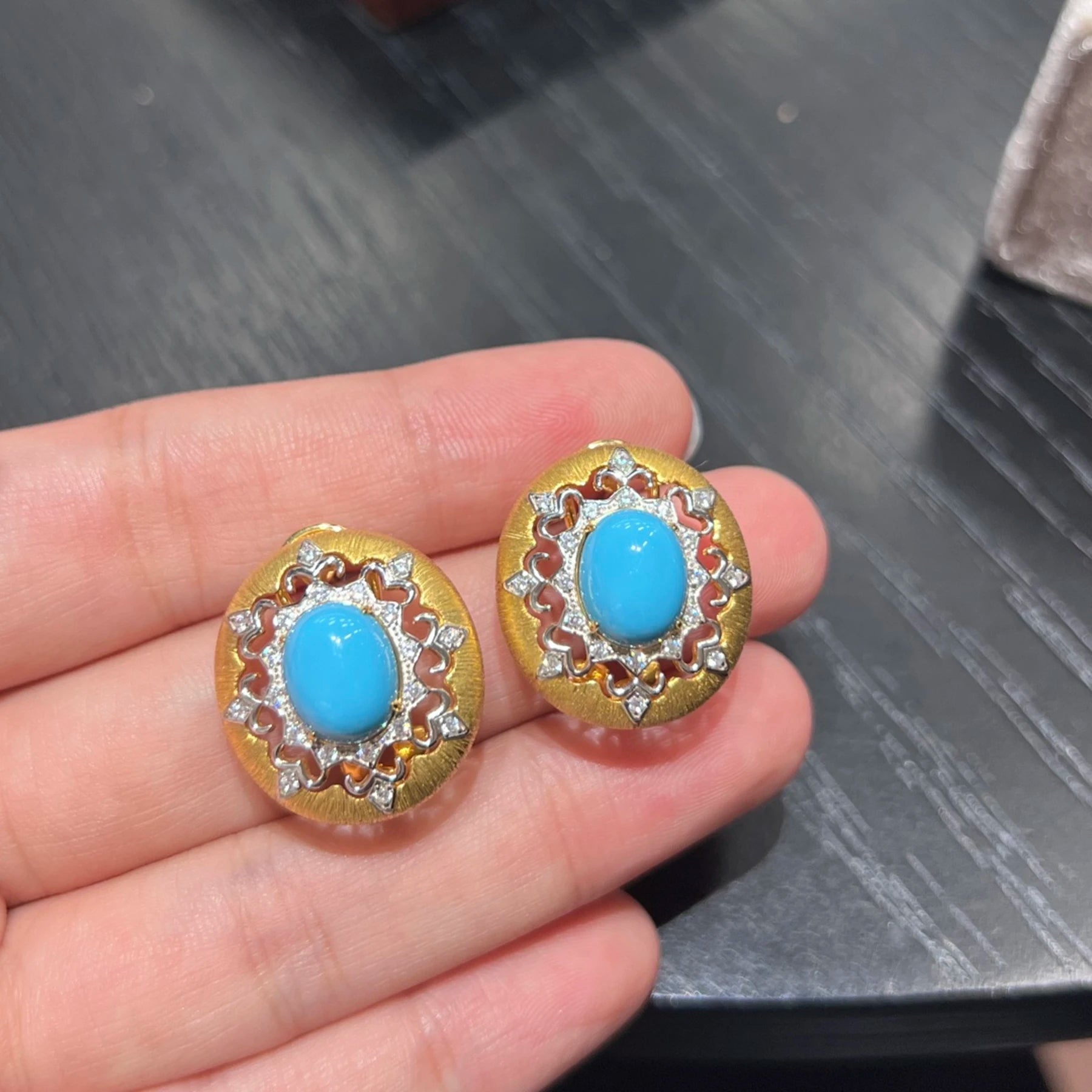 close up vintage blue turquoise earrings with cubic zirconia details
