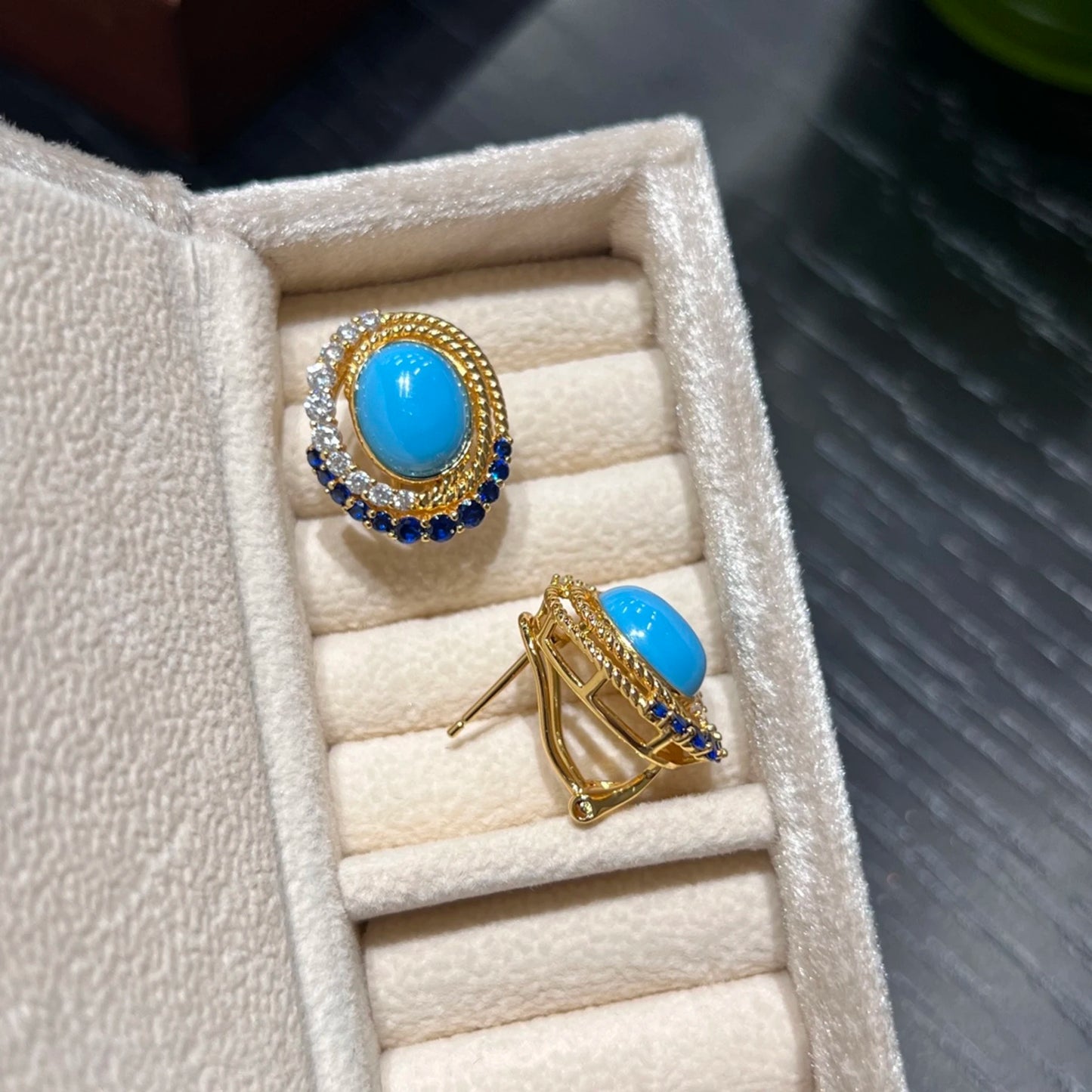 side view of 18k gold plated sterling silver turquoise stud earrings