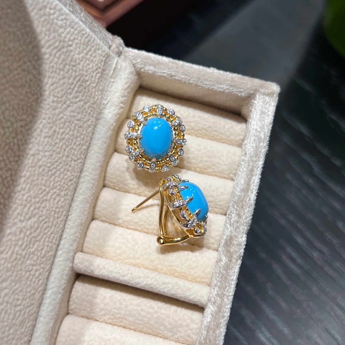 side view of sterling silver created turquoise stud earrings with push back closure